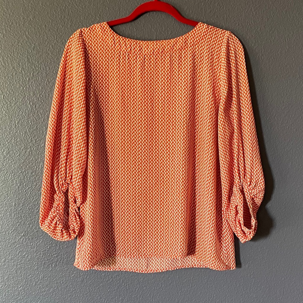 Ladies orange patterned blouse